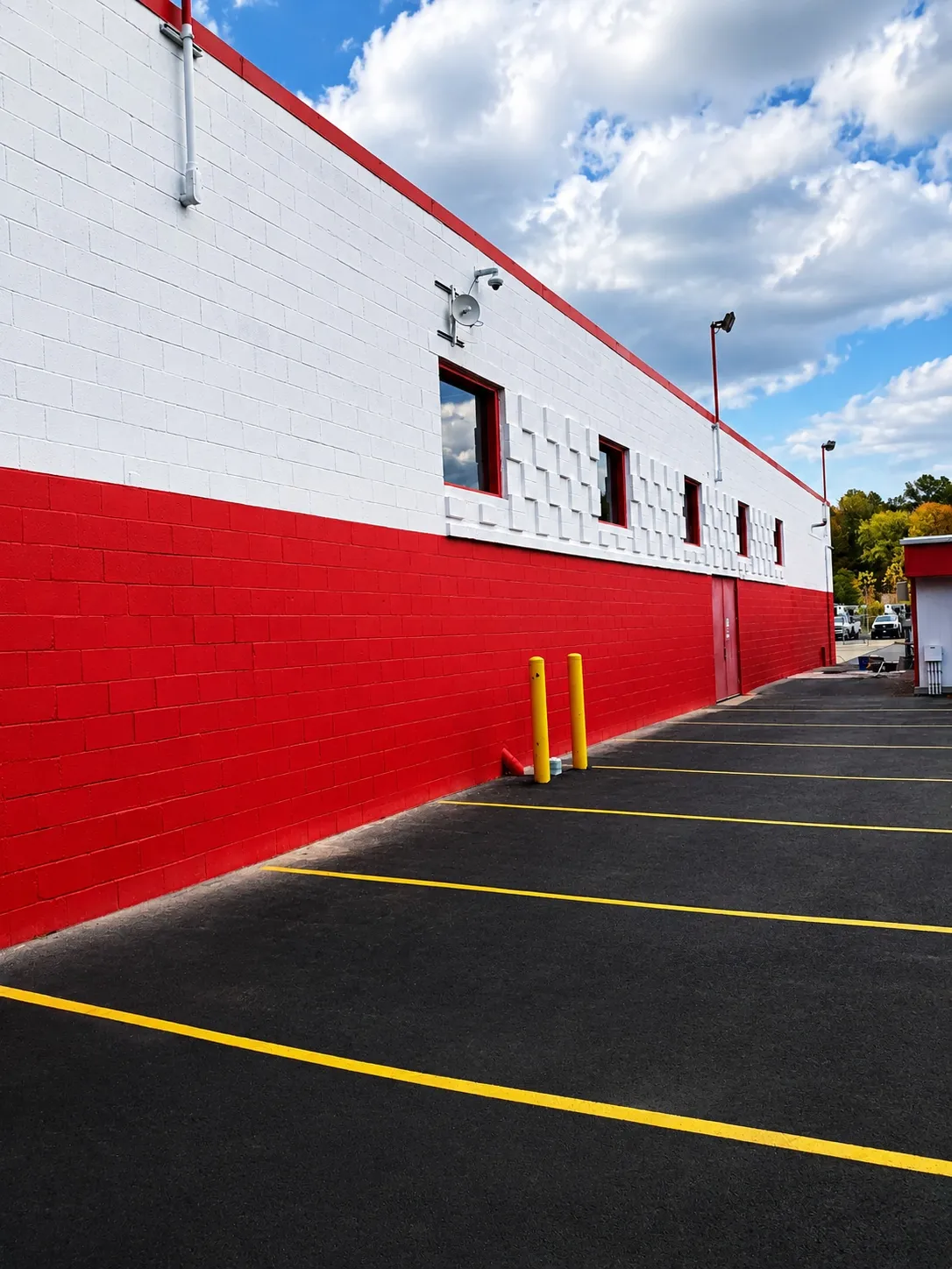 Red and white commercial block building exterior